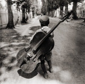 Gypsy boy with cello, Hungary 1931